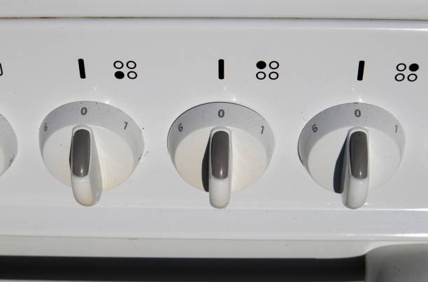 istock dusty electric kitchen stove control switches 1395491025