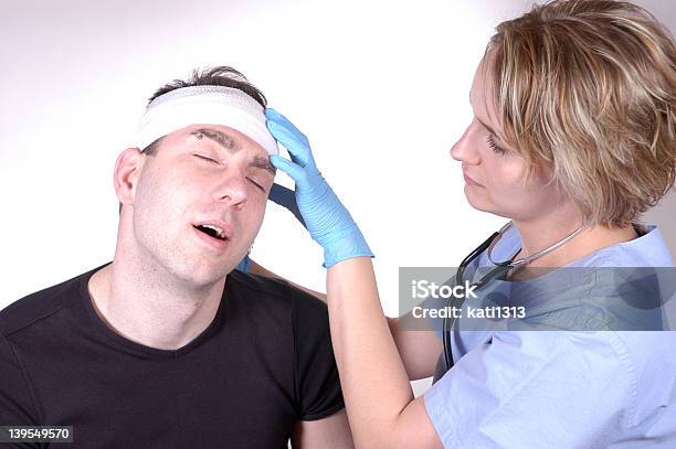 Head Injury Stock Photo - Download Image Now - Accidents and Disasters, Adhesive Bandage, Adult