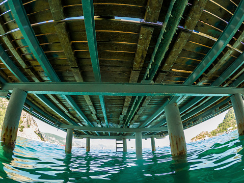 View under a pier/jetty of the waves