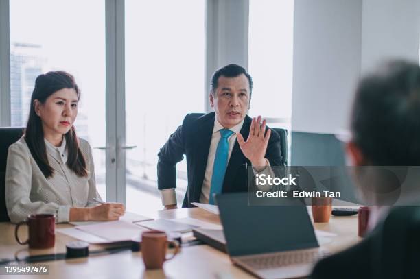 Asian Head Of Department Argument Disagreement In Meeting Room Stock Photo - Download Image Now