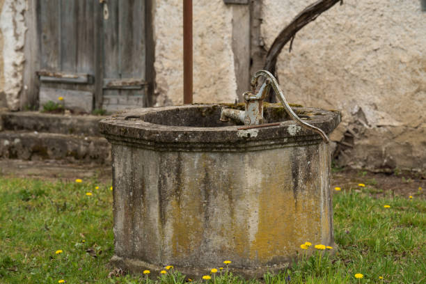 istock An old well at the farm. 1395497552
