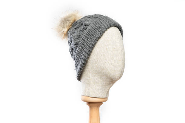 istock Gray knit beanie with mannequin head on white background 1395497857