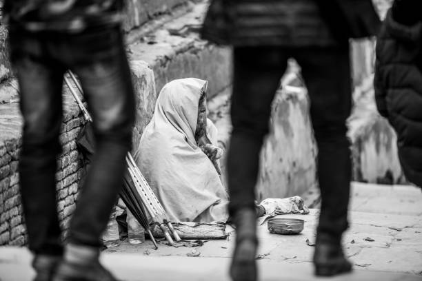 Kathmandu, Nepal- April 20,2019 : The persons with disabilities begs on the street of Pashupatinath Temple in Kathmandu, Nepal.