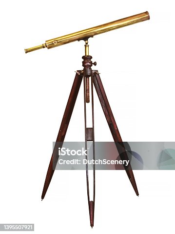 istock Ancient telescope with wooden tripod isolated on a white background 1395507921