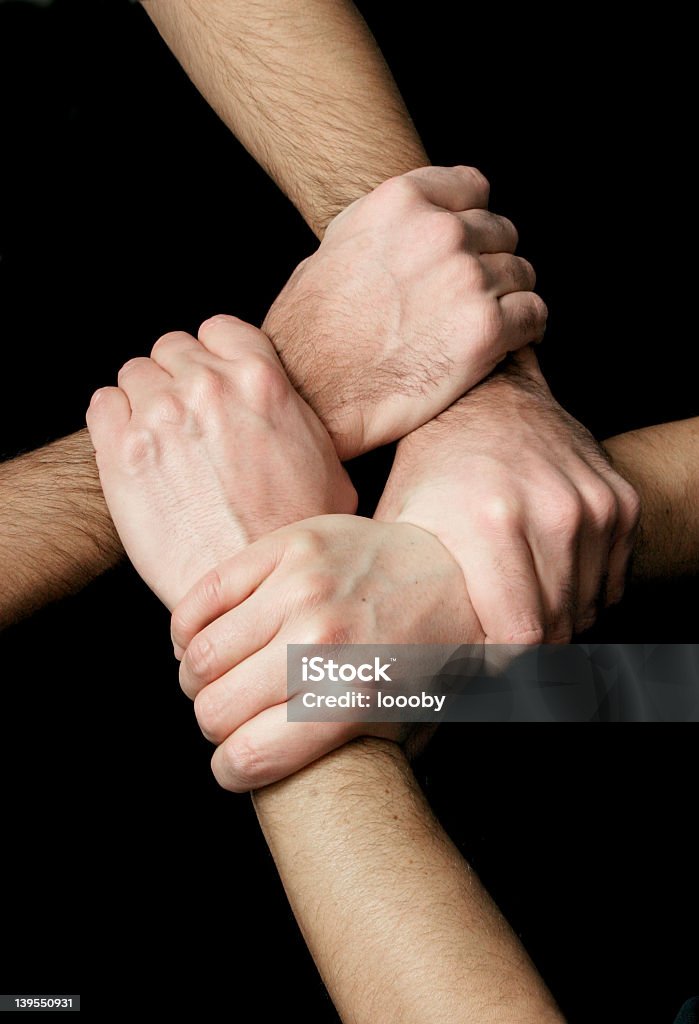 Manos unidas - Foto de stock de Endentado libre de derechos