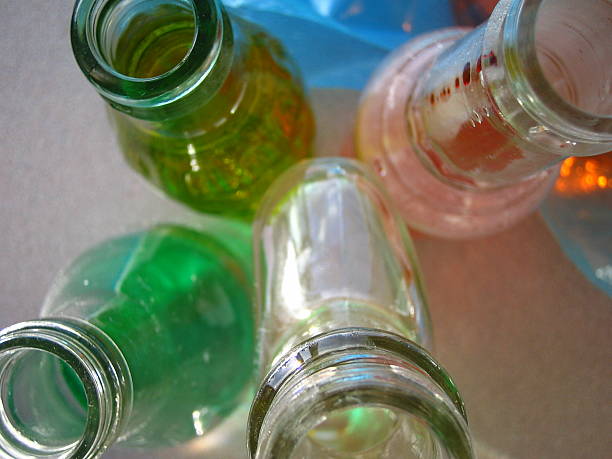 istock glass bottles, viewed from the top 139551024