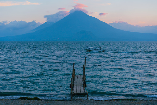 Beautiful view of boat on  Atitlan Lake in Guatemala at sunset