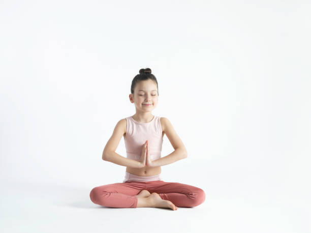 istock Cute Girl Doing Yoga 1395513645