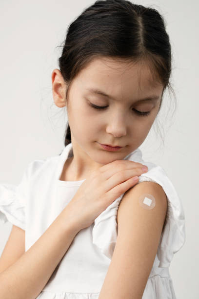 istock Girl Getting Covid-19 Vaccine 1395513694