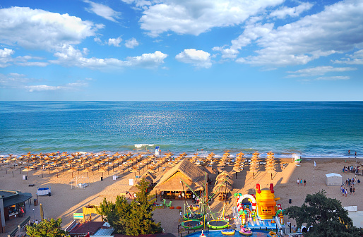 Resort Golden Sands Bulgaria panoramic top view  of the beach in summer. Children's entertainment on the beach.