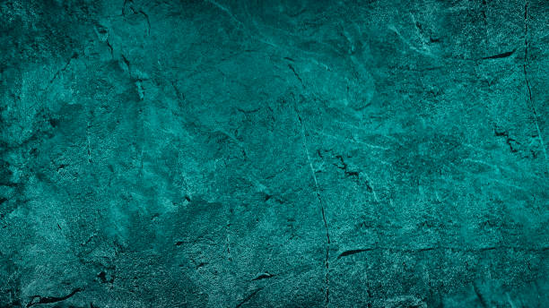 青緑色の抽象的な背景。色調の粗い岩の表面テクスチャ。デザインのためのコピースペースと美しい青緑色の背景。 - teal color ストックフォトと画像