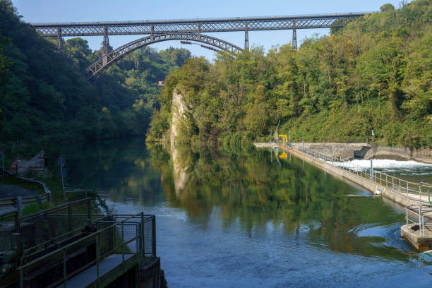 istock Iron bridge at Paderno over the Adda river, italy 1395517841