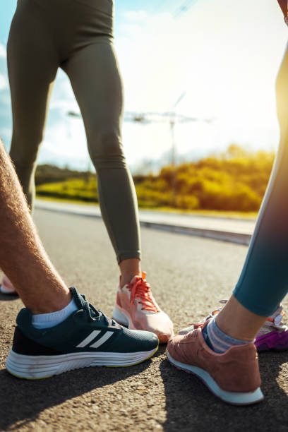 istock Side view of runners standing together. 1395530329