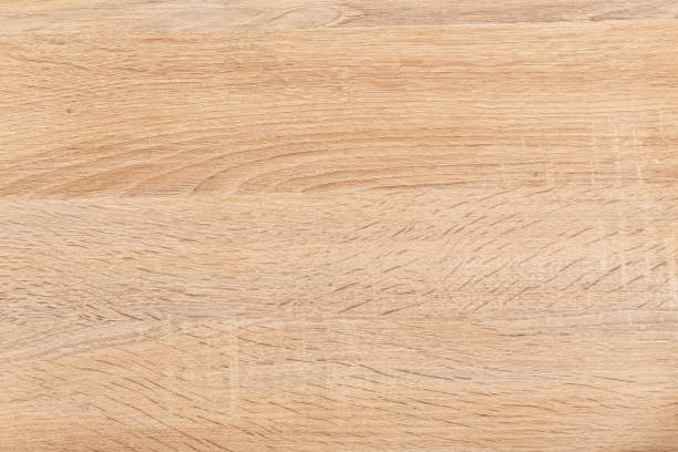 istock Wood texture. oak toned in yellow. Rough sanded surface. 1395533925