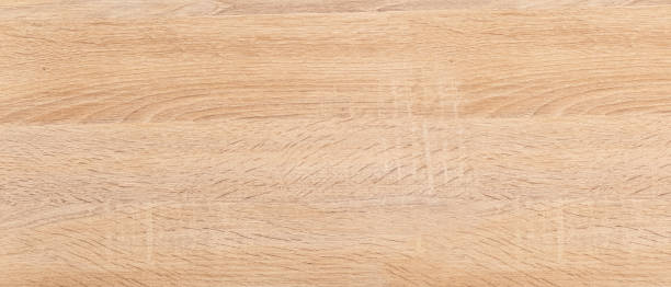 istock Beige rough wooden texture background. Table top view 1395534038