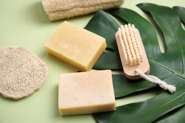 istock Eco friendly personal care products and leaf on light green background 1395537941