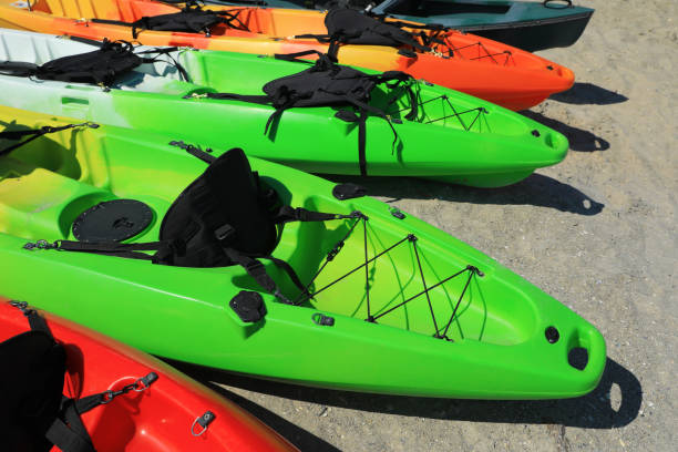 istock Many colorful kayaks outdoors on sunny day 1395538299