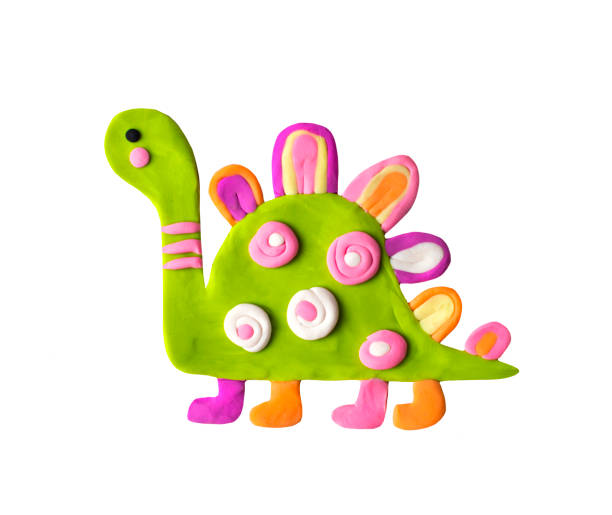 istock Cute cartoon comic funny handmade clay plasticine prehistoric dinosaur animal smiling character. 1395540379