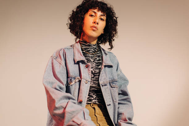 istock Stylish young woman looking at the camera 1395541220