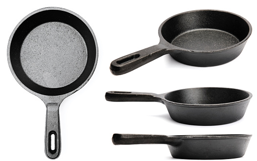 Black frying pan four views isolated on white with clipping path