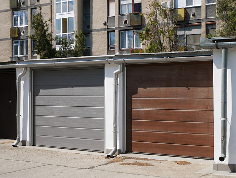 Garages in front of apartment buildings