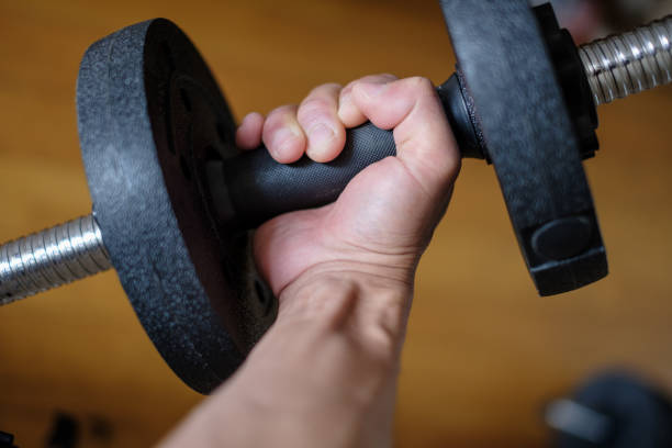 istock bodybuilding with dumbbells the muscles come out 1395546985