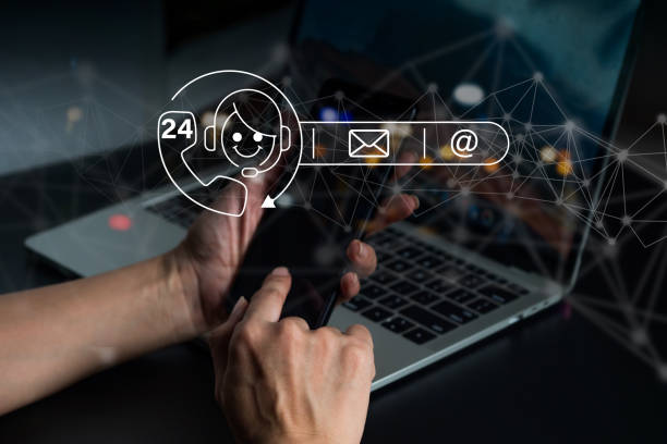 istock A woman indicates an operator's emblem, which includes iconography for after-sales services. Customer satisfaction communication channel 1395549672