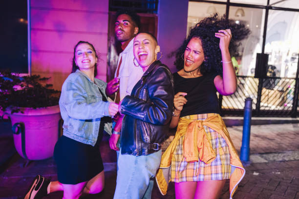 istock Friends having fun together on a weekend night 1395559285