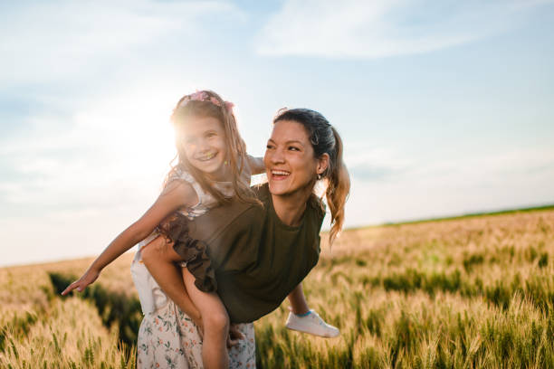 istock Mother and daughter enjoying nature 1395559409