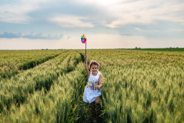 istock Happy girl enjoying nature 1395559423