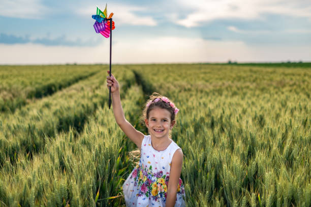 istock Happy girl enjoying nature 1395560024