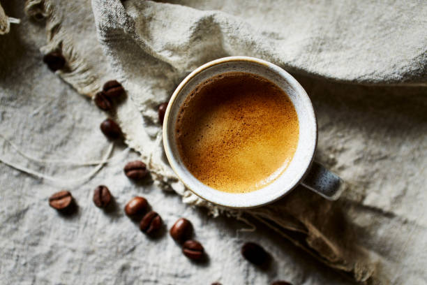 istock Cup of espresso coffee on linen cloth. Top view 1395561276