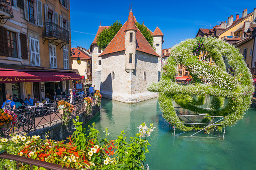 The Palais de l'Isle on an island in the river Thiou in Annecy, on summer day in France