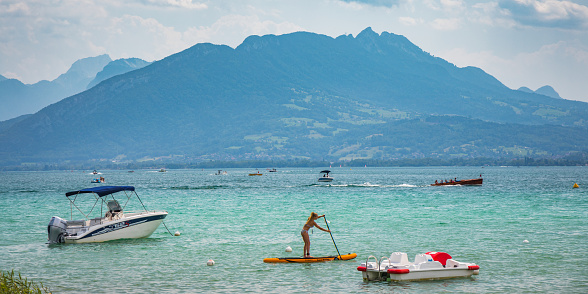 Lake annecy view with the French Alps in the background in Annecy in Haute-Savoie, France
