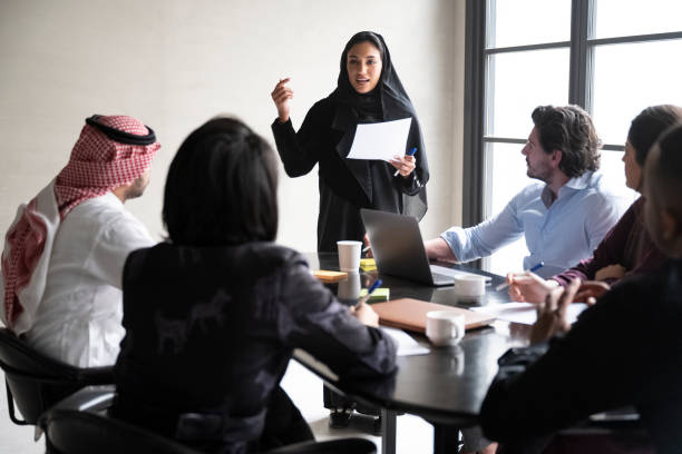 istock Riyadh business team listening to young project manager 1395570246