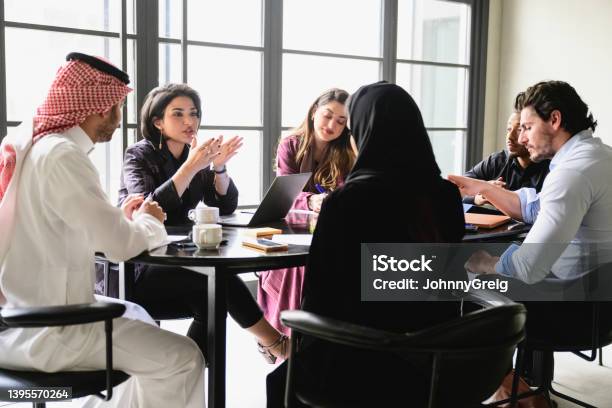 Young Riyadh Business Team Collaborating In Meeting Room Stock Photo - Download Image Now