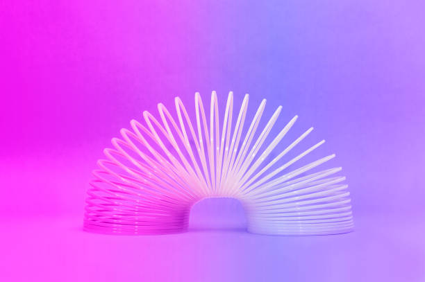 istock Toy plastic neon rainbow spiral, antistress concept. 1395570508