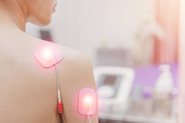 istock TENS Electrode Pads prepare for treatment on shoulder pain, 1395571765