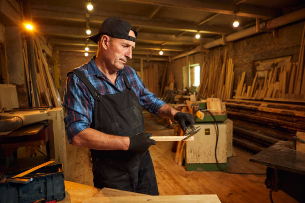 istock Senior professional carpenter working with caliper in the carpentry workshop 1395579777