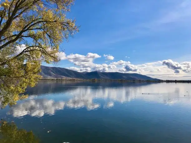 Reflections on the peaceful lake of Kastoria