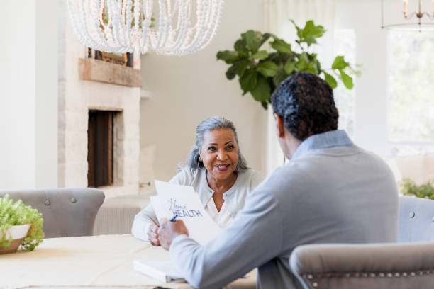 istock Couple sits at the dining room table 1395585829