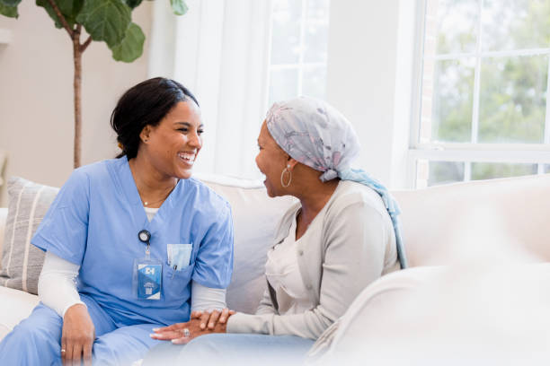 istock The nurse visits with her patient 1395585882