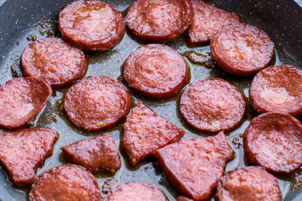 Deep-fried beef sausage in a pan. type of meat used in Turkish breakfasts Deep-fried beef sausage in a pan. type of meat used in Turkish breakfasts turkish sausage stock pictures, royalty-free photos & images
