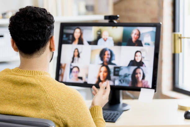 istock Rear view of a video call. 1395588062