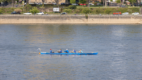 Cologne, Germany: Apr 21st 2022: River Rhine is a busy waterway in Germany, used by nautical vessels of all sizes.