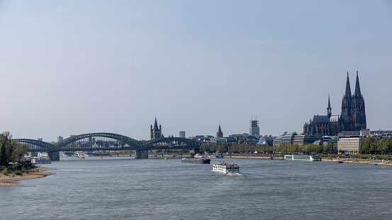 Cologne, Germany: Apr 21st 2022: River Rhine is a busy waterway in Germany, used by nautical vessels of all sizes.