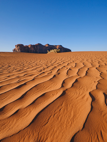 Desert sand under at sunset in Monument Valley USA.