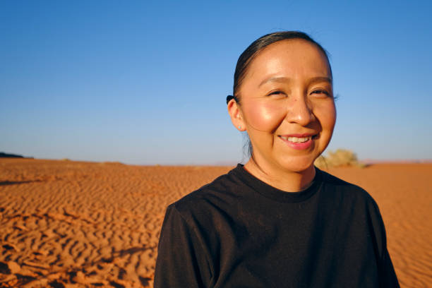 istock Woman in Monument Valley 1395601125