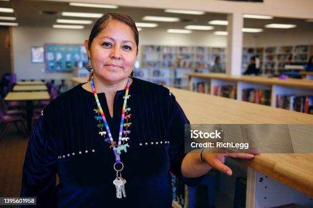 High School Teacher In A Library Stock Photo - Download Image Now - Indigenous Peoples of the Americas, Teacher, Indigenous North American Culture