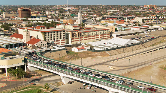 Aerial view of Laredo, Texas on a sunny afternoon with U.S Mexico Border.\n\nAuthorization was obtained from the FAA for this operation in restricted airspace.